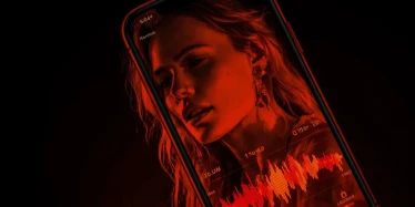 alaito_agency_person_speaking_into_smartphone_recording_voice_294780c5